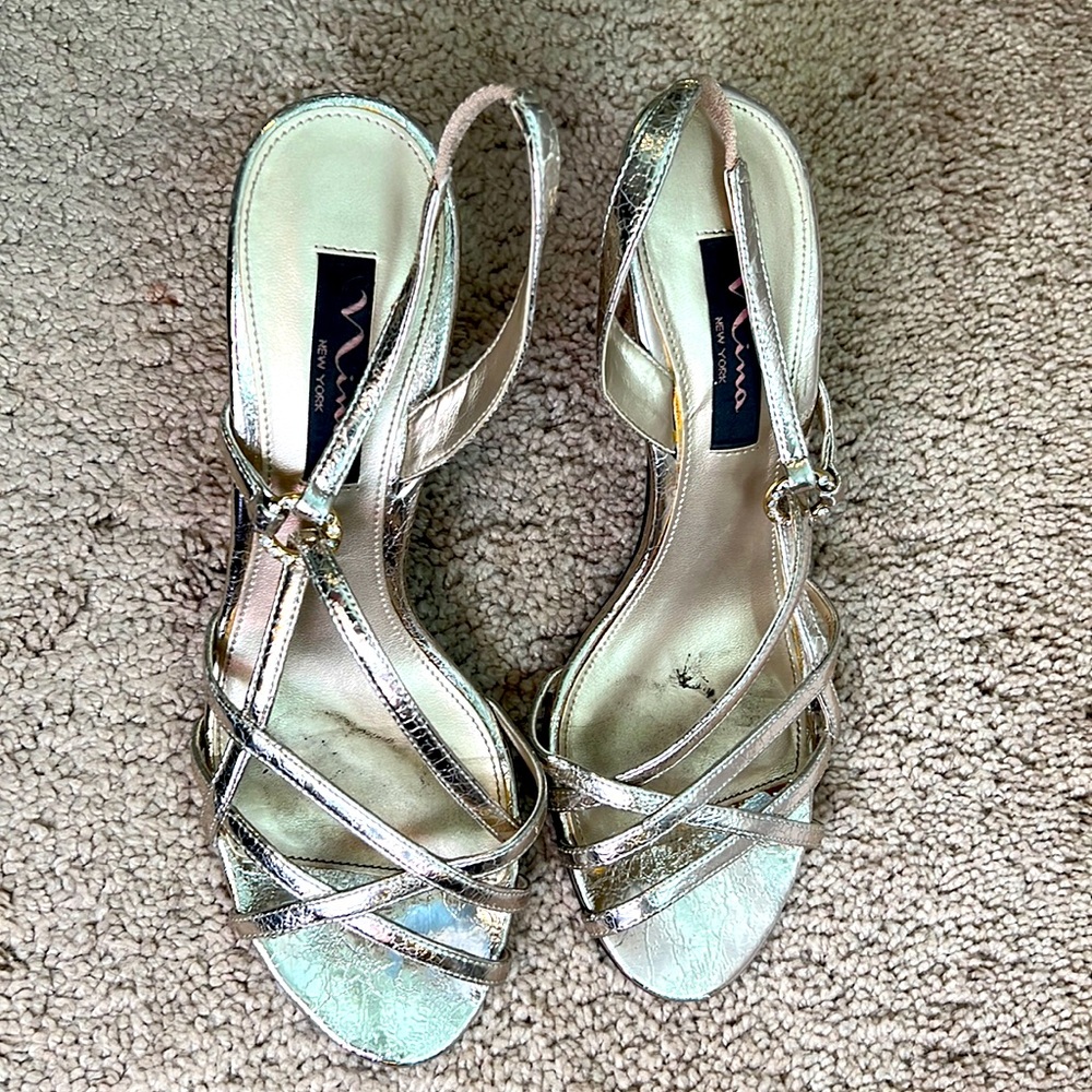 Gold strappy heeled sandals